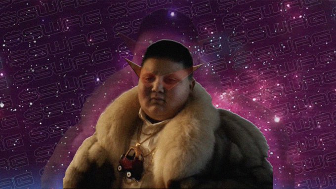 $SWAG meme: elf character in red $SWAG glasses in purple space